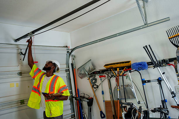Professional Garage Door Panel Replacement technician working in Home Gardens, CA